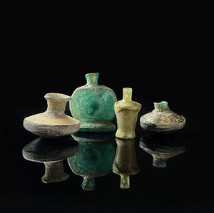 COLLECTION OF 4 ROMAN BOTTLES